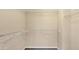 Spacious walk-in closet with built-in wire shelving for optimal storage at 1909 N 106Th Ave, Avondale, AZ 85392