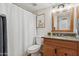 Cozy bathroom with a granite-topped vanity and cute elephant artwork for a comforting and stylish space at 200 E Southern Ave # 133, Tempe, AZ 85282