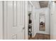 Hallway that shows view into a room with wood-style floors and modern finishes provides a glimpse of a room at 200 E Southern Ave # 133, Tempe, AZ 85282