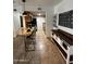 Stylish kitchen with granite countertops, a breakfast bar, and stainless steel appliances at 200 E Southern Ave # 133, Tempe, AZ 85282