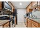 This kitchen is equipped with stainless steel appliances and granite countertops at 200 E Southern Ave # 133, Tempe, AZ 85282