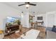 Open concept living area with a ceiling fan, modern furnishings, and lots of natural light at 200 E Southern Ave # 133, Tempe, AZ 85282