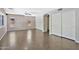Bedroom featuring neutral walls, tile flooring, closet, and windows offering natural light and privacy at 2418 W White Feather Ln, Phoenix, AZ 85085