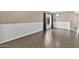Cozy living area with large windows, tile flooring, and neutral walls offering a comfortable and inviting space at 2418 W White Feather Ln, Phoenix, AZ 85085