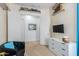 Bonus room with ample storage, shelving and open doorway at 26065 N 74Th Dr, Peoria, AZ 85383
