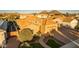 Charming single-Gathering home featuring a two-car garage, desert landscaping, and a brick driveway at 26065 N 74Th Dr, Peoria, AZ 85383