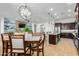 Open-concept living space with combined kitchen, living, and dining areas perfect for entertaining at 26065 N 74Th Dr, Peoria, AZ 85383
