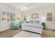 Bright bedroom with plantation shutters, plush carpet, and relaxing decor at 26065 N 74Th Dr, Peoria, AZ 85383