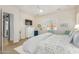 Calm main bedroom with sitting area, plantation shutters, and a walk-in closet at 26065 N 74Th Dr, Peoria, AZ 85383