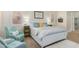 Comfortable main bedroom with plantation shutters and a cozy seating area at 26065 N 74Th Dr, Peoria, AZ 85383