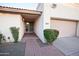 Inviting front entrance with brick walkway and desert landscaping leading to a covered doorway at 2635 N 62Nd St, Mesa, AZ 85215