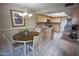Eat in kitchen features a dining table and stainless steel appliances at 2635 N 62Nd St, Mesa, AZ 85215