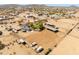 Large horse property featuring extensive horse facilities, paddocks, and rural desert charm at 28061 N Holly Rd, San Tan Valley, AZ 85143