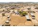 Spacious lot with equestrian facilities, offering ample space for outdoor activities and a rural lifestyle at 28061 N Holly Rd, San Tan Valley, AZ 85143