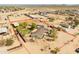 Scenic aerial view of property highlighting the serene desert landscape and mature trees at 28061 N Holly Rd, San Tan Valley, AZ 85143