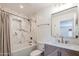 Bathroom with marble tile, a modern vanity and bronze fixtures at 28061 N Holly Rd, San Tan Valley, AZ 85143
