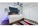 Charming bedroom featuring a fun theme, ceiling fan, and cozy decor, perfect for a comfortable and stylish space at 28061 N Holly Rd, San Tan Valley, AZ 85143