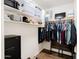 Walk-in closet offers ample storage space and a security safe at 28061 N Holly Rd, San Tan Valley, AZ 85143