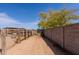 Dirt area with side fence to a horse pen at 28061 N Holly Rd, San Tan Valley, AZ 85143