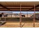 Wide shot of a horse pen, showing the size, sturdy fencing, and ample space for livestock, and providing a secure enclosure at 28061 N Holly Rd, San Tan Valley, AZ 85143