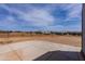 Expansive horse property features fencing, paddocks, and ample space for equestrian activities under a bright, open sky at 28061 N Holly Rd, San Tan Valley, AZ 85143