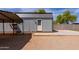 Metal outbuilding with concrete path, a versatile space for various uses at 28061 N Holly Rd, San Tan Valley, AZ 85143