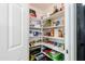 Pantry showcasing abundant shelving with food and household items at 28061 N Holly Rd, San Tan Valley, AZ 85143