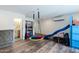 Spacious playroom with a play structure and a connected bathroom at 28061 N Holly Rd, San Tan Valley, AZ 85143