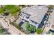 A two-story home featuring a backyard oasis with a patio, pergola, lush landscaping, and a spacious second story balcony at 3025 W Sentinel Rock Rd, Phoenix, AZ 85086