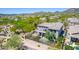 Aerial view of backyard with a large, comfortable patio, and desert landscaping in a mountain community at 3025 W Sentinel Rock Rd, Phoenix, AZ 85086