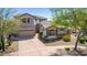 Stunning two-story home featuring a three car garage, with a well-manicured front yard at 3025 W Sentinel Rock Rd, Phoenix, AZ 85086