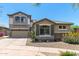 Charming two-story home with a balcony and low-maintenance desert landscaping at 3025 W Sentinel Rock Rd, Phoenix, AZ 85086