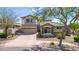 Charming two-story home with a neutral color palette, balcony, two-car garage and desert landscaping at 3025 W Sentinel Rock Rd, Phoenix, AZ 85086