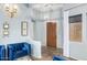 Elegant living room with blue couches, decorative lighting, and neutral walls at 3025 W Sentinel Rock Rd, Phoenix, AZ 85086