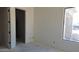 Unfinished bedroom with a doorway and window at 3374 E Aquarius Ct, Chandler, AZ 85249