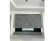 Living room boasts sleek gray tiled fireplace with storage niches and recessed lighting at 3374 E Aquarius Ct, Chandler, AZ 85249