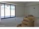 Bright living room with large sliding doors under construction, creating a seamless indoor-outdoor flow at 3374 E Aquarius Ct, Chandler, AZ 85249