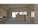 Large living room with modern fireplace and sliding glass doors under construction at 3374 E Aquarius Ct, Chandler, AZ 85249
