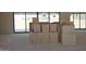 Spacious living room under construction with sliding glass doors offering panoramic views at 3374 E Aquarius Ct, Chandler, AZ 85249