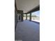 Large covered patio with tile flooring and view to backyard undergoing construction at 3374 E Aquarius Ct, Chandler, AZ 85249