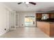 Open kitchen area leads to backyard with patio and pool view via large sliding glass door at 3916 W Northview Ave, Phoenix, AZ 85051