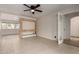 Large living room featuring tile floors, modern fixtures, and an open layout with seamless transitions at 3916 W Northview Ave, Phoenix, AZ 85051