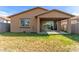 View of the back of the house and backyard featuring a covered patio at 4050 W Coles Rd, Laveen, AZ 85339