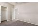 Spacious bedroom with neutral walls, plush carpet, and two closets for optimal storage at 4050 W Coles Rd, Laveen, AZ 85339