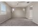 Spacious bedroom featuring carpet, neutral paint and a window with natural light at 4050 W Coles Rd, Laveen, AZ 85339