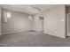 Spacious bedroom with carpet, neutral paint and ensuite bathroom at 4050 W Coles Rd, Laveen, AZ 85339
