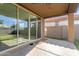Covered patio with ceiling fan, sliding glass door to the house, and tile flooring at 4050 W Coles Rd, Laveen, AZ 85339