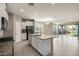 Spacious eat-in kitchen featuring granite countertops, recessed lighting, and an island with a sink at 4050 W Coles Rd, Laveen, AZ 85339