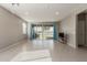 Spacious living room featuring tile floors, recessed lighting and a glass slider at 4050 W Coles Rd, Laveen, AZ 85339