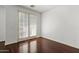 Cozy bedroom featuring wood floors and natural light at 4411 N 24Th Way, Phoenix, AZ 85016